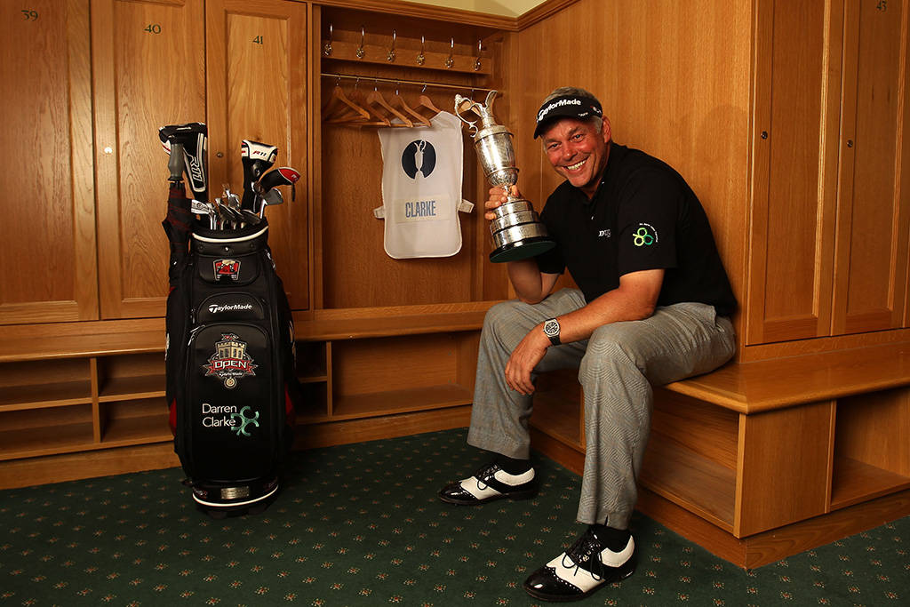 Darren Clarke poses with the Claret Jug after winning The Open